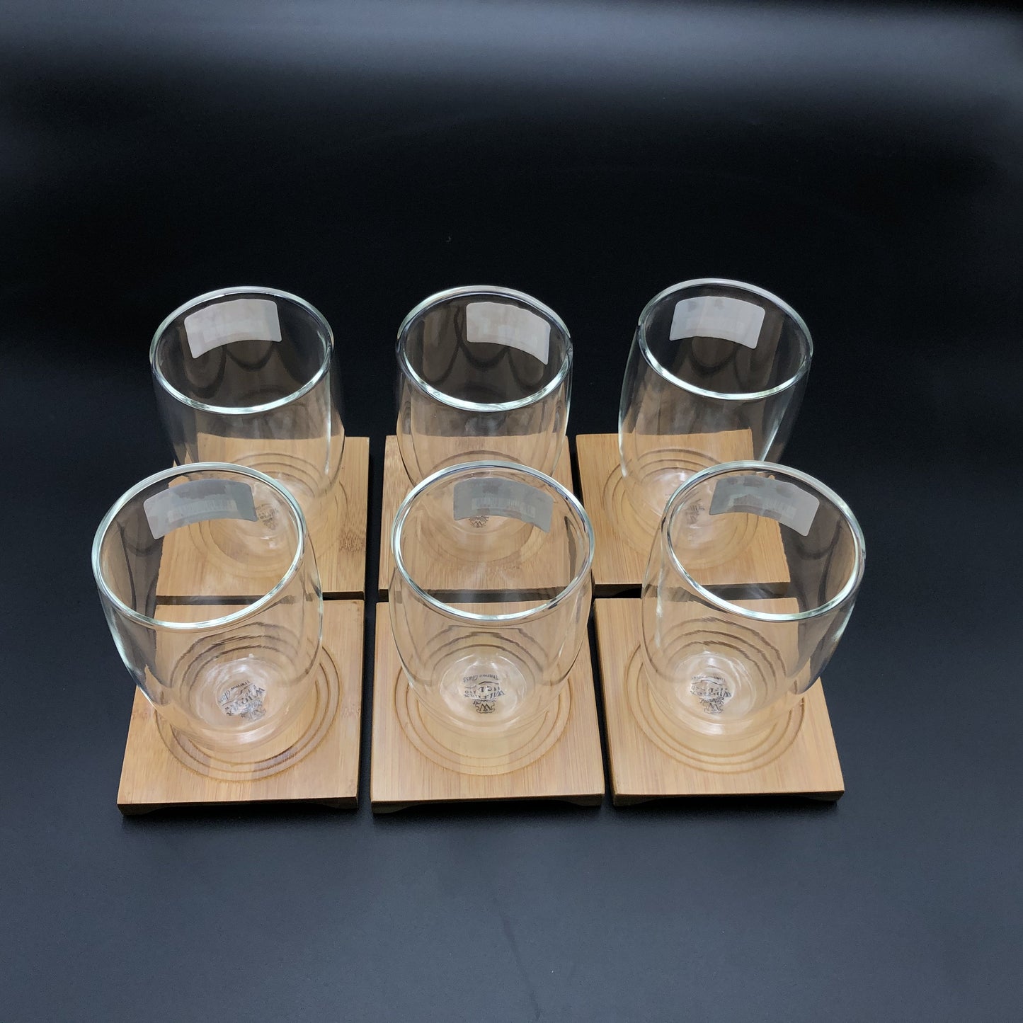 A Set Of 6 Bamboo Coaters/ Trays With 6 Doublewalled Thermo Glasses To Match-1